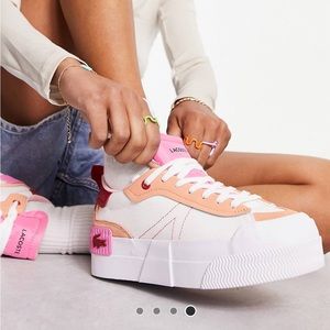 Adorable Lacoste platforms. Only wore three times super comfortable and cute.